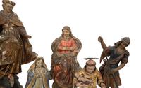 A Group of Eight Carved and Polychromed Santos Figures
