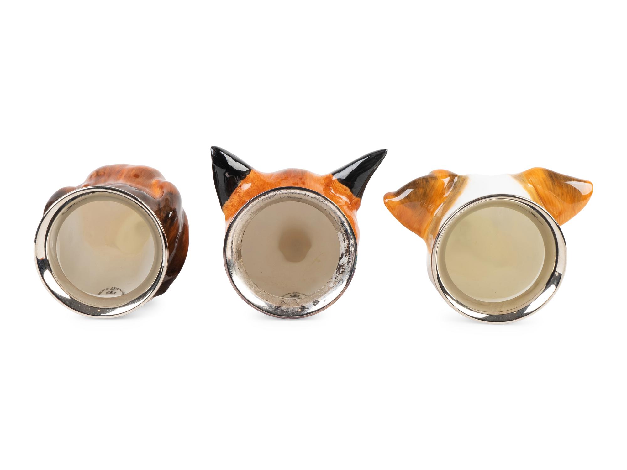 Three Royal Stratford Porcelain Stirrup Cups — 20TH CENTURY