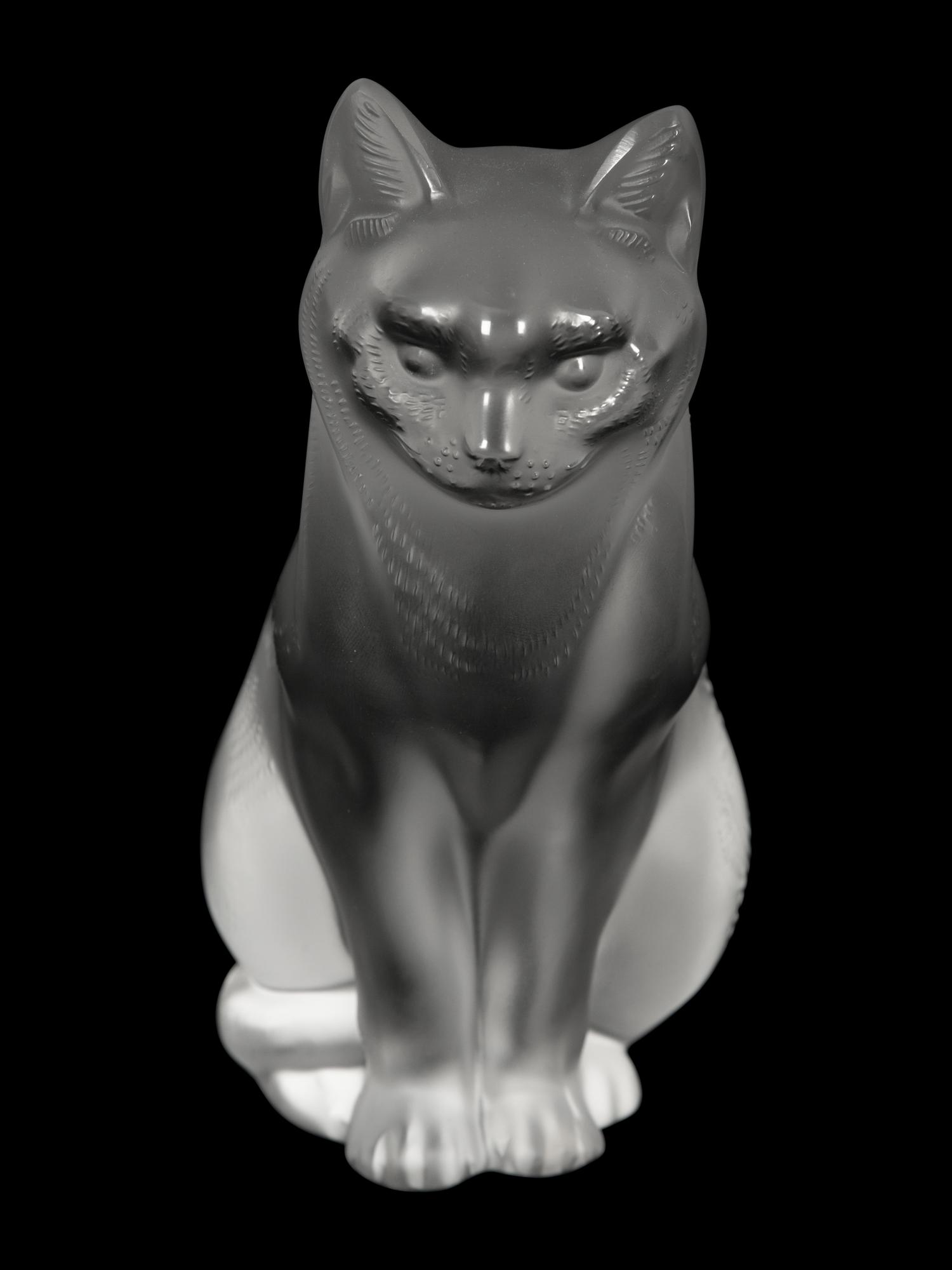 A Lalique Chat Assis Sculpture and a Lalique Chat Couche Sculpture