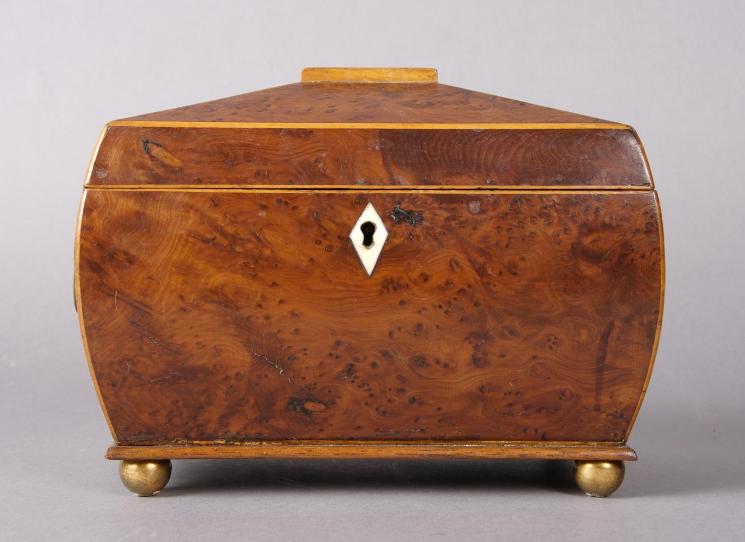 A George III Burlwood Tea Caddy, Height 6 1/4 x width 8 1/4 x depth 5 inches.