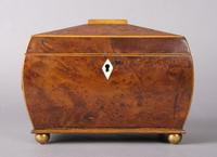A George III Burlwood Tea Caddy, Height 6 1/4 x width 8 1/4 x depth 5 inches.