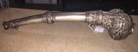 A Tibetan Silvered Metal Horn. Length 14 3/4 inches.
