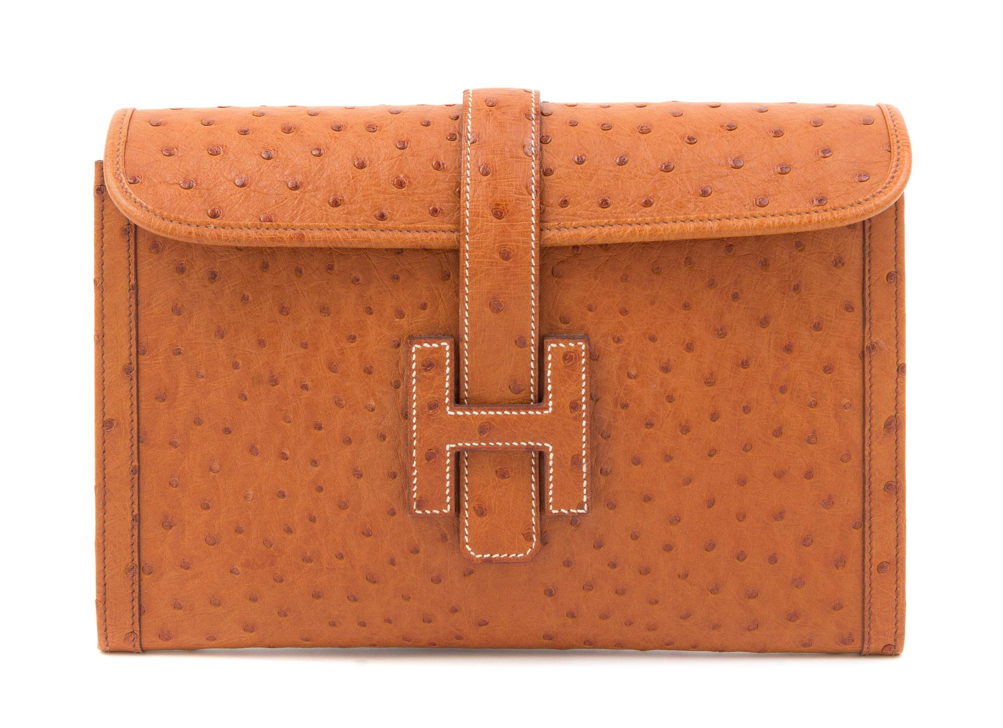 An Hermes Gold Jige Elan 29 Ostrich Clutch, 11.5" x 6" 1.5".
