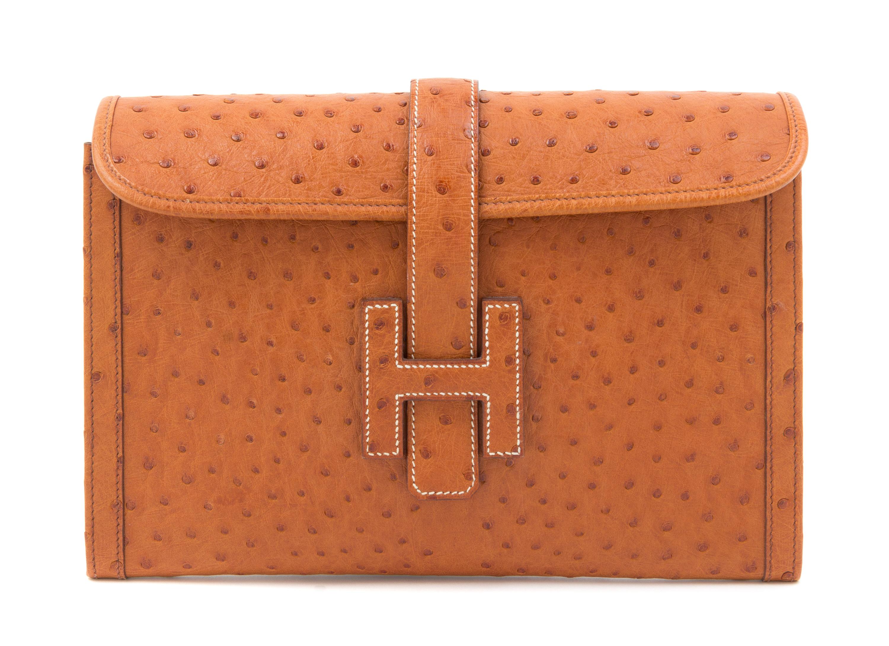 An Hermes Gold Jige Elan 29 Ostrich Clutch, 11.5" x 6" 1.5".