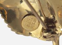 A Miscellaneous Collection of Gold Brooches