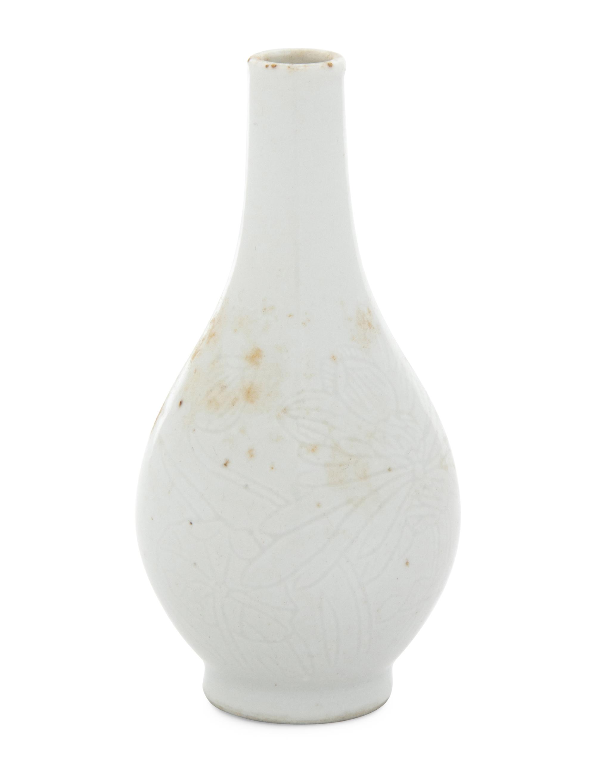 An Incised White Glazed Porcelain Bottle Vase