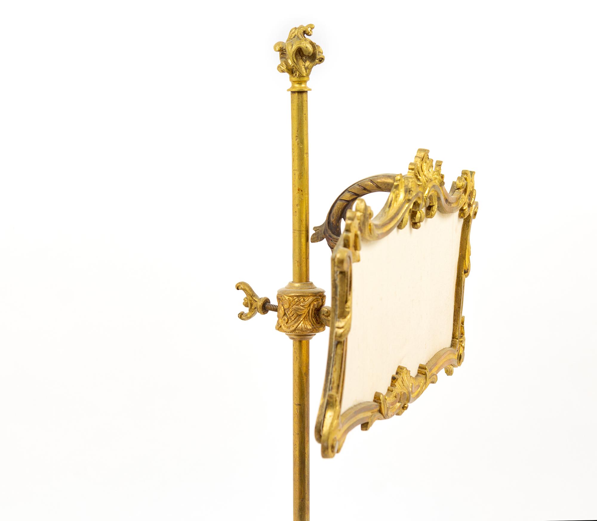 A Louis XV Style Gilt Bronze Candelabrum with Screen