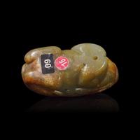 A Small Chinese Brown and Celadon Jade Mythical Beast, Ming Dynasty or Earlier 明或更早 青玉瑞獸