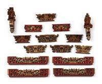 A Group of Chinese Gilt and Red Lacquered Wood Fragments