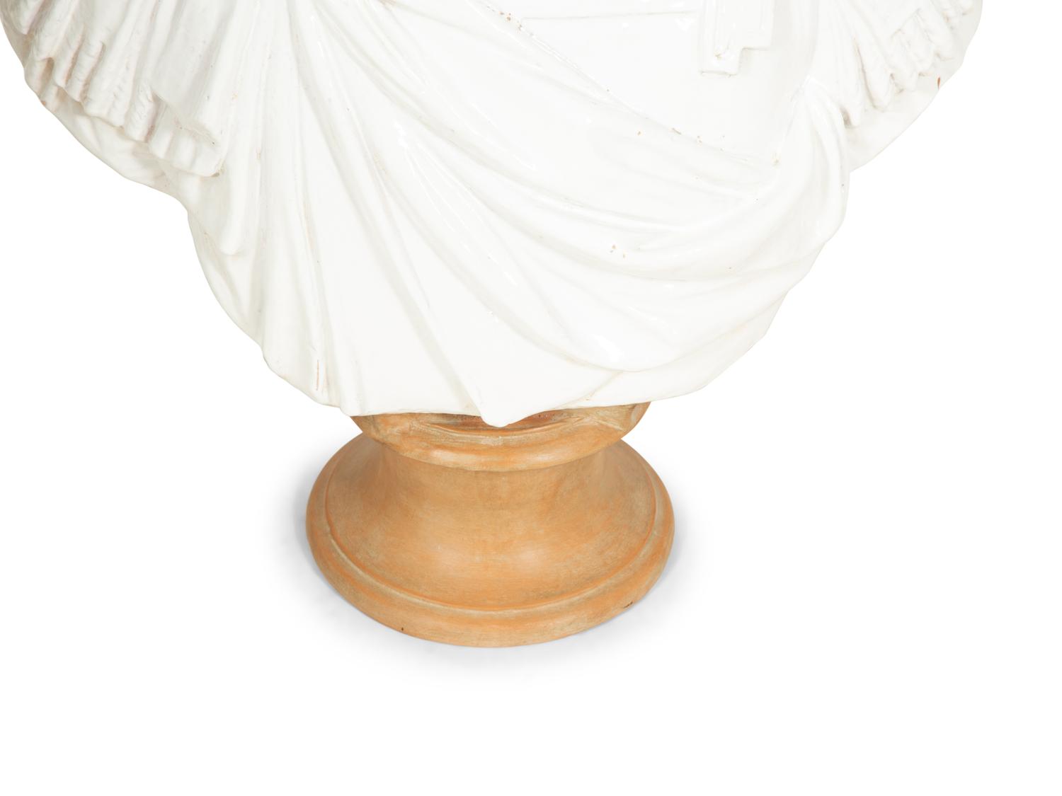An Italian Glazed Terracotta Bust of a Roman Senator