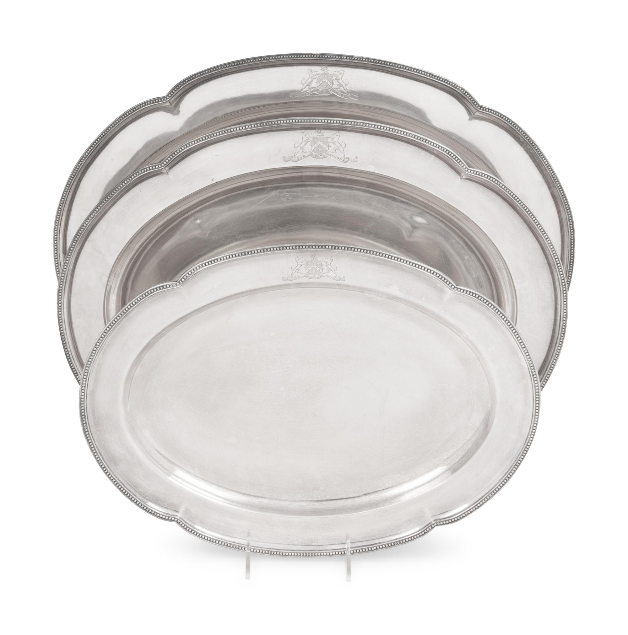 A Set of Three Graduated English Silver-Plate Trays with Engraved Coats of Arms