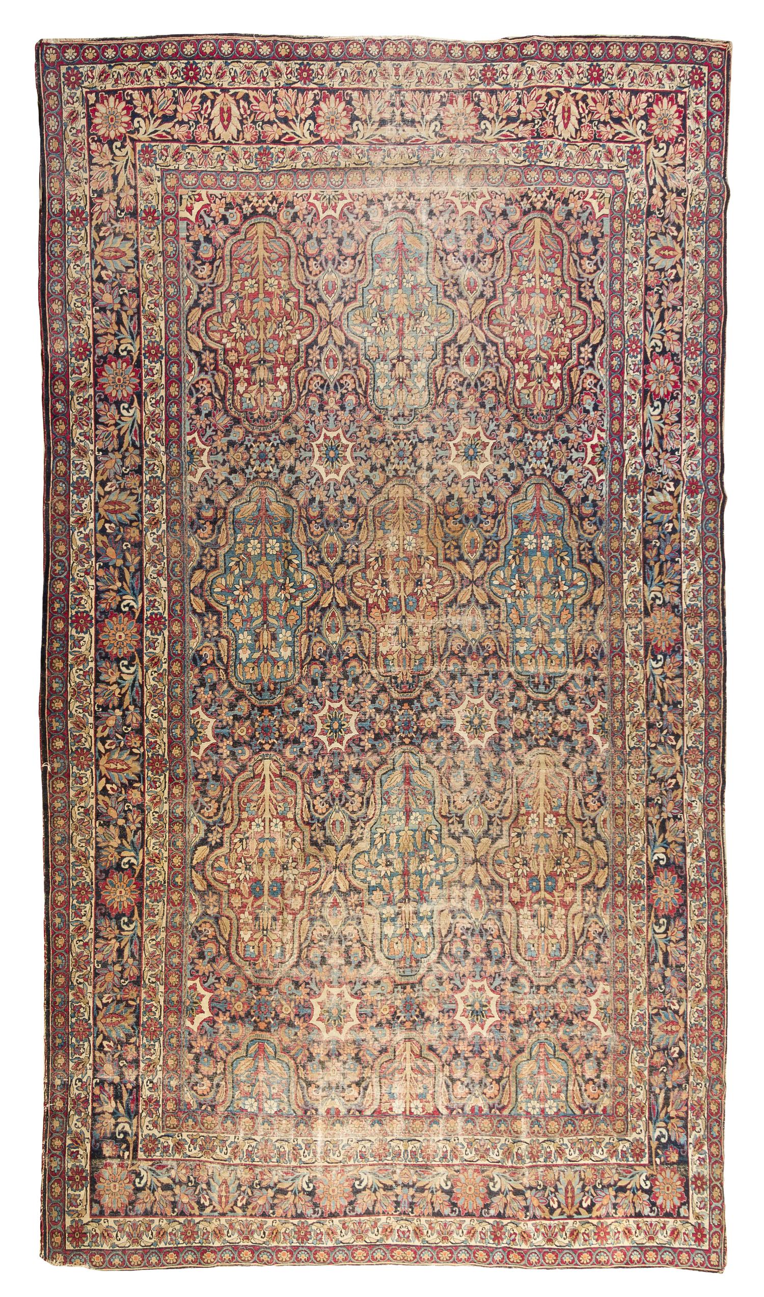 A Kirman Wool Rug 14 feet 7 inches x 8 feet 9 inches.