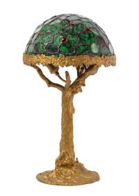A Leaded Ruby-in-Zoisite Table Lamp Diameter of shade 13 inches, height overall 24 inches. — JULIE RAUSCHENBERGER, LATE 20TH CENTURY