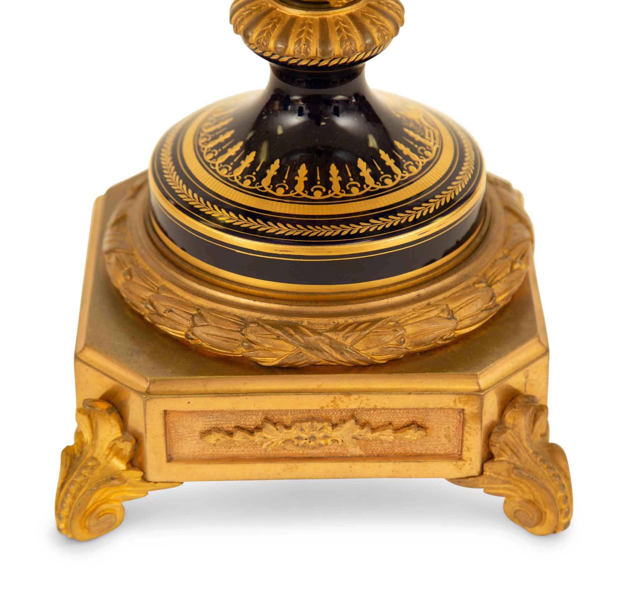 A Sèvres Style Gilt Metal Mounted Porcelain Urn and Cover