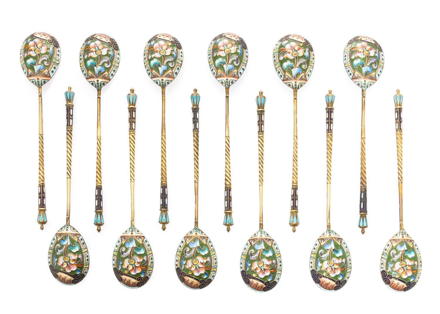 A Set of Twelve Russian Silver and Enamel Spoons, Mark of 20th Artel, Moscow, early 20th century, each having an enameled finial surmou