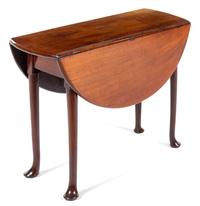 A George II Mahogany Drop-Leaf Table Height 27 1/2 x width 36 x depth 14 1/2 inches (closed). — MID-18TH CENTURY