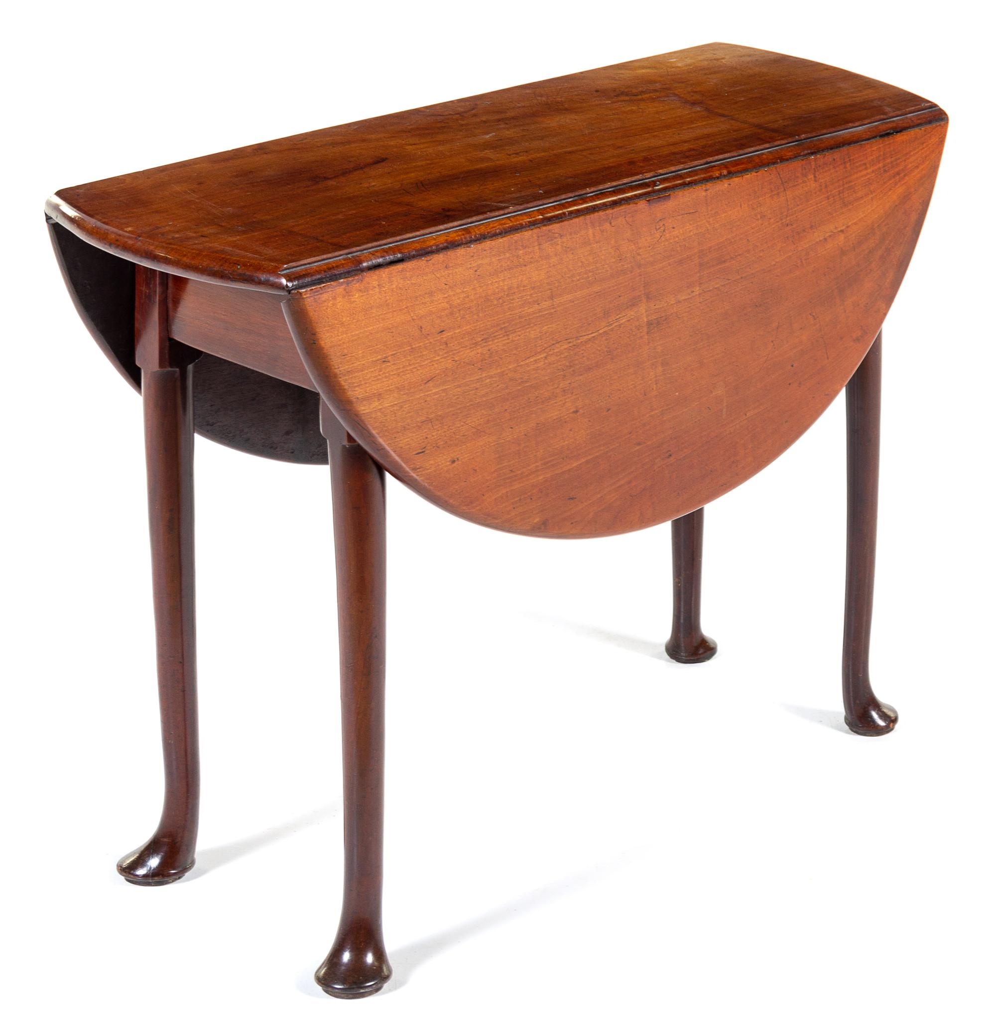 A George II Mahogany Drop-Leaf Table Height 27 1/2 x width 36 x depth 14 1/2 inches (closed). — MID-18TH CENTURY