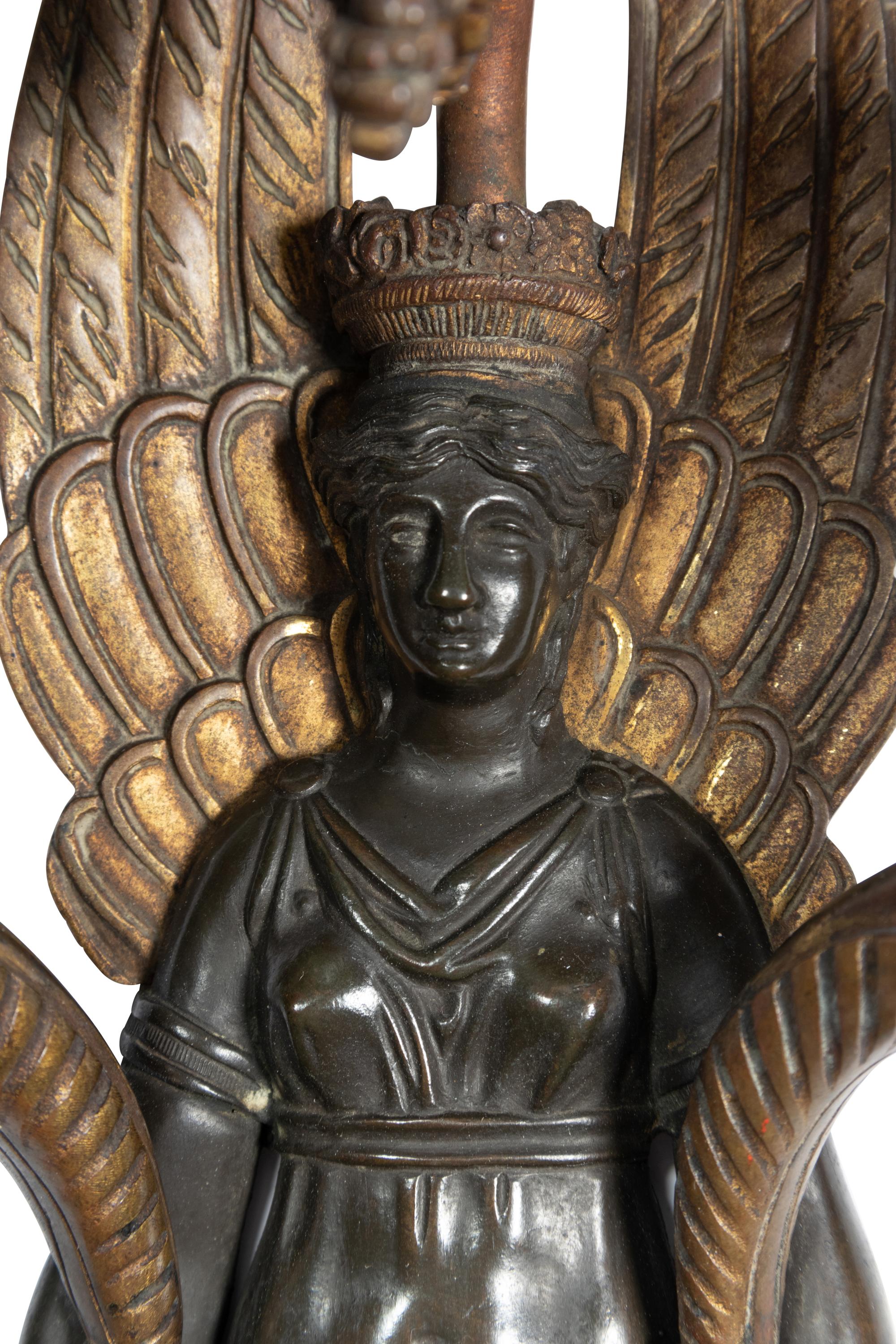 A Pair of Empire Style Brass Three-Light Figural Sconces