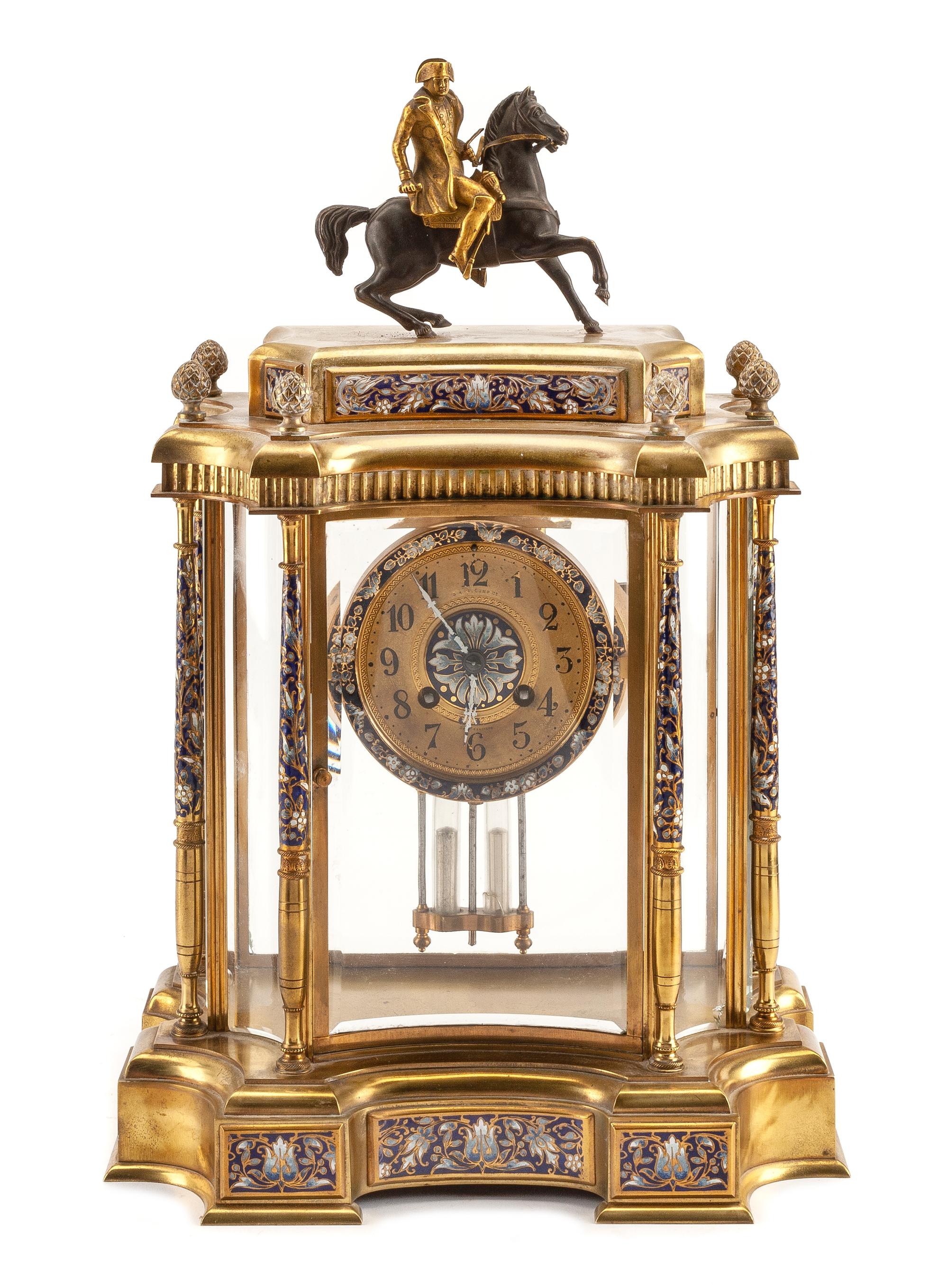 A Champleve Decorated Bronze Mantel Clock Height 17 1/2 inches.