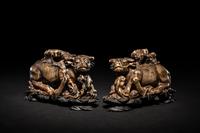 A Pair of Chinese Brown Hardstone 'Ox and Herd' Figural Groups