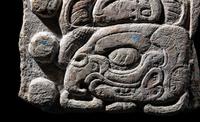 A Maya Limestone Fragment with Glyphs