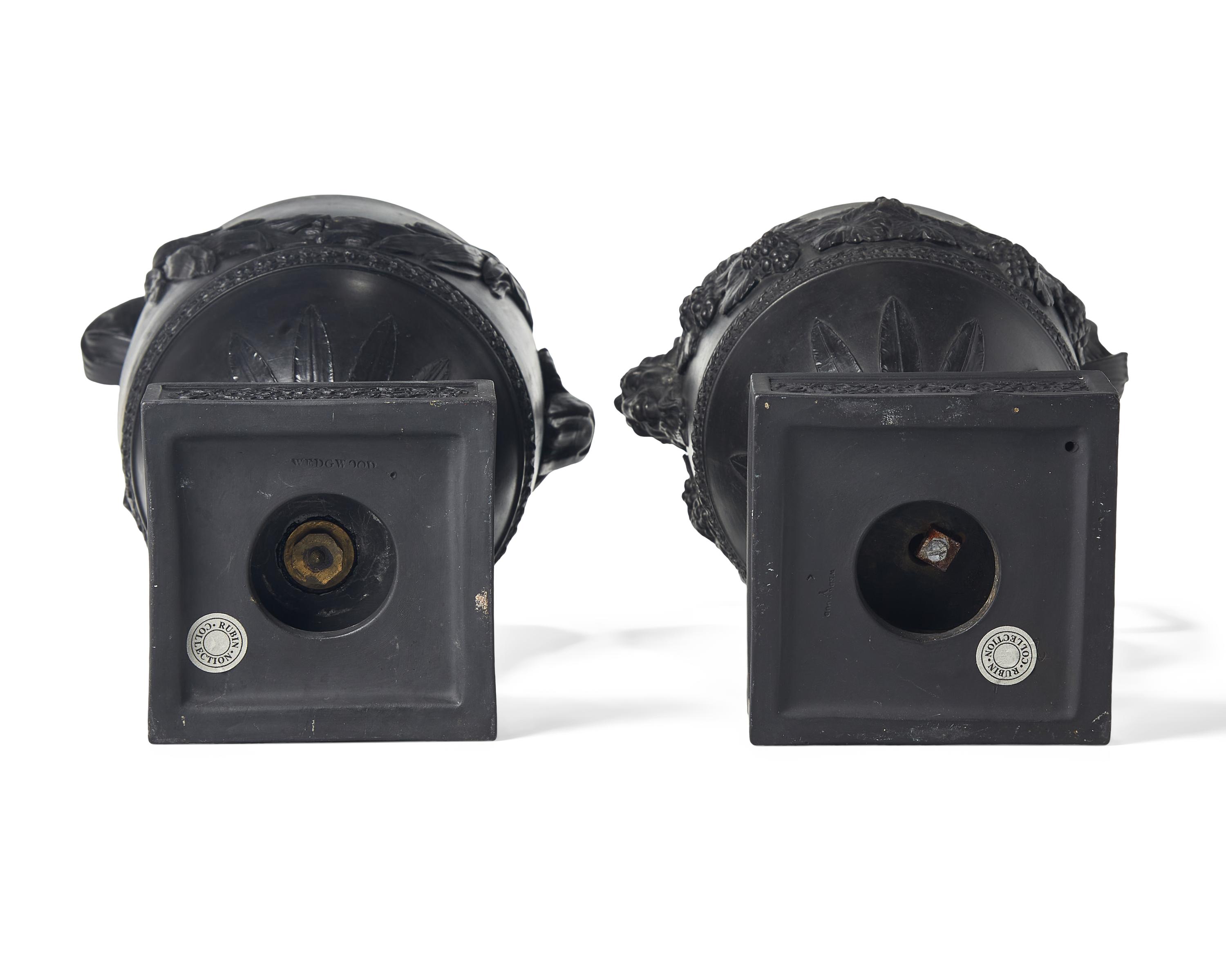 A Pair of Wedgwood Black Basalt Figural Ewers