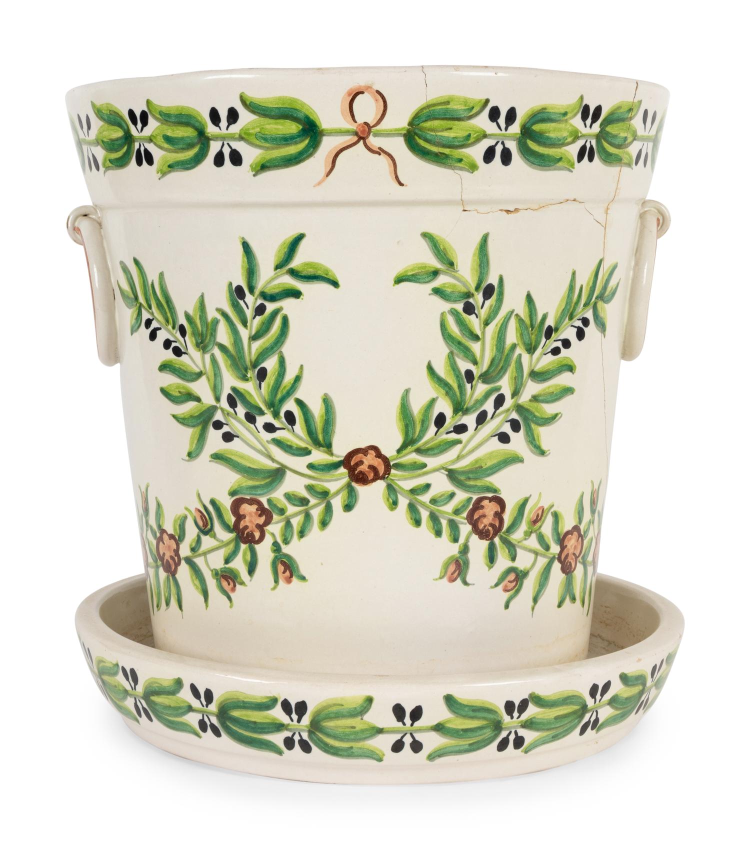 A Portuguese Polychrome Glazed Jardini è re and Tray