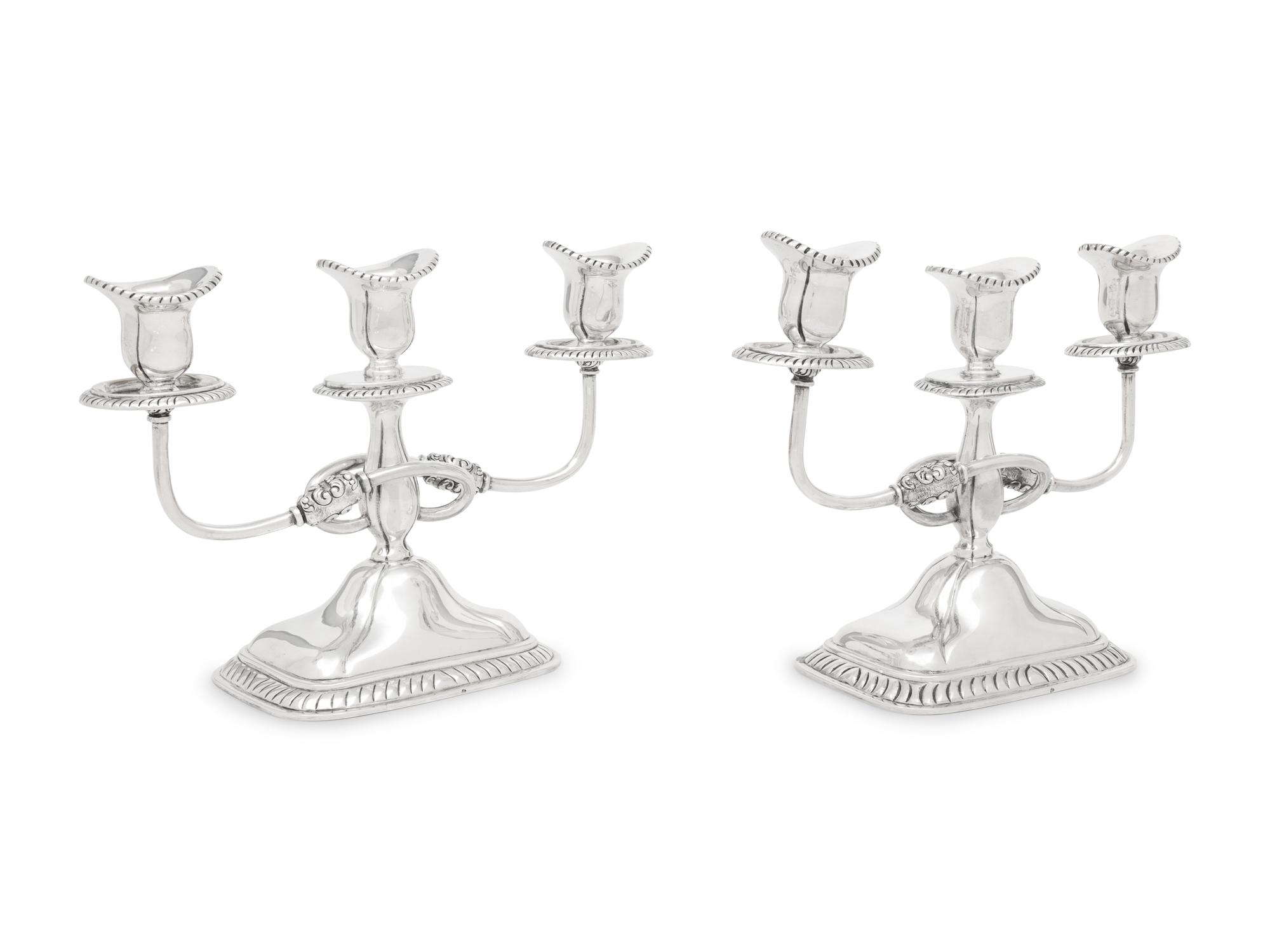 A Pair of Sanborns Silver Three-Light Candelabra
