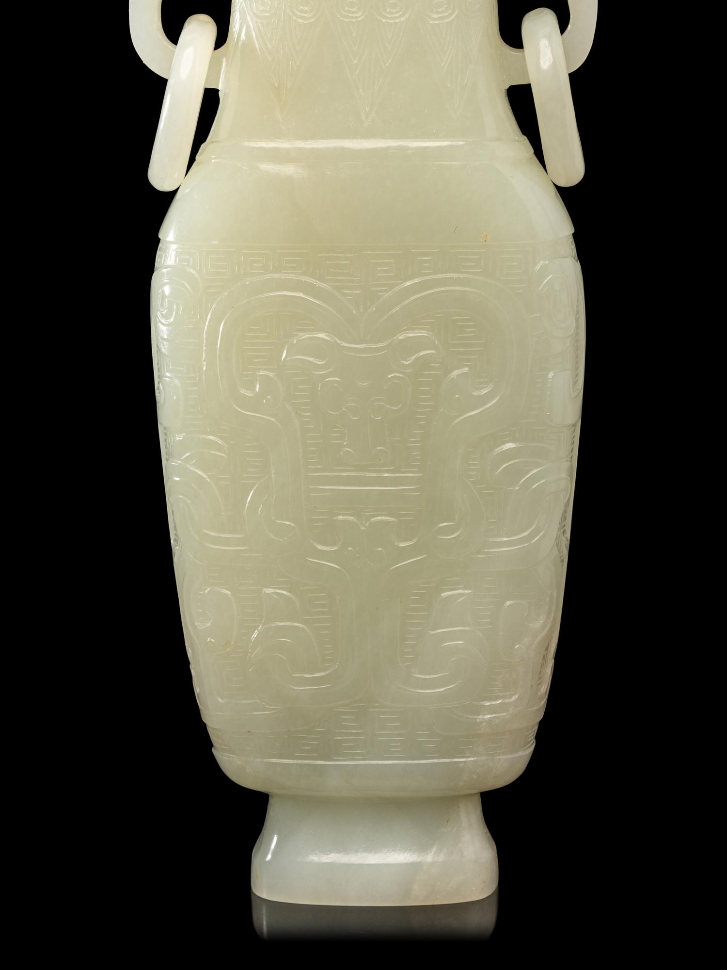 A Chinese Pale Celadon Jade Flattened Vase, Late Qing/Republic Period 晚清/民國 青白玉仿古雙耳瓶