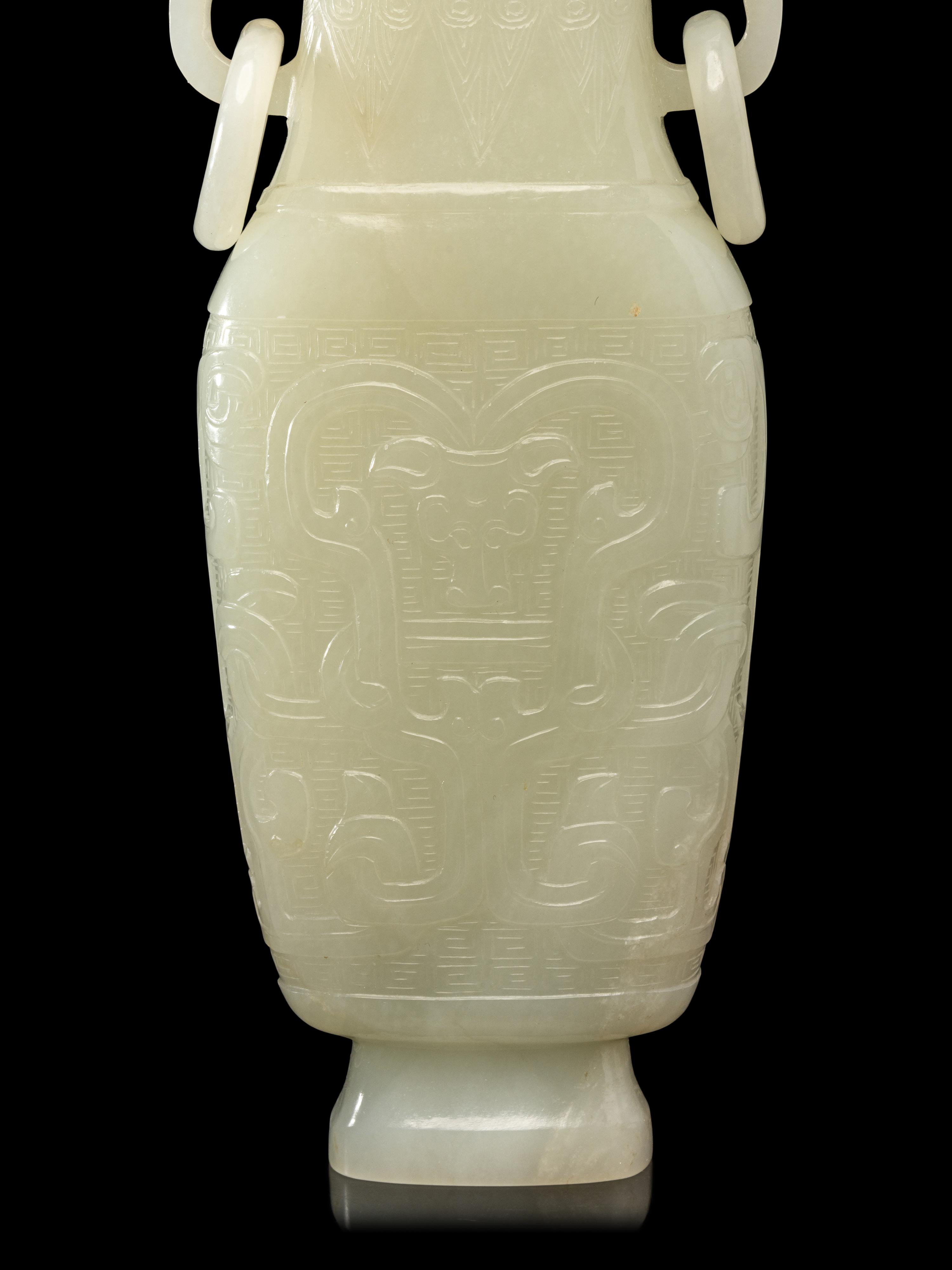 A Chinese Pale Celadon Jade Flattened Vase, Late Qing/Republic Period 晚清/民國 青白玉仿古雙耳瓶