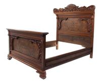 A Victorian Burlwood Bed Height of headboard 65 inches. — 19TH/20TH CENTURY