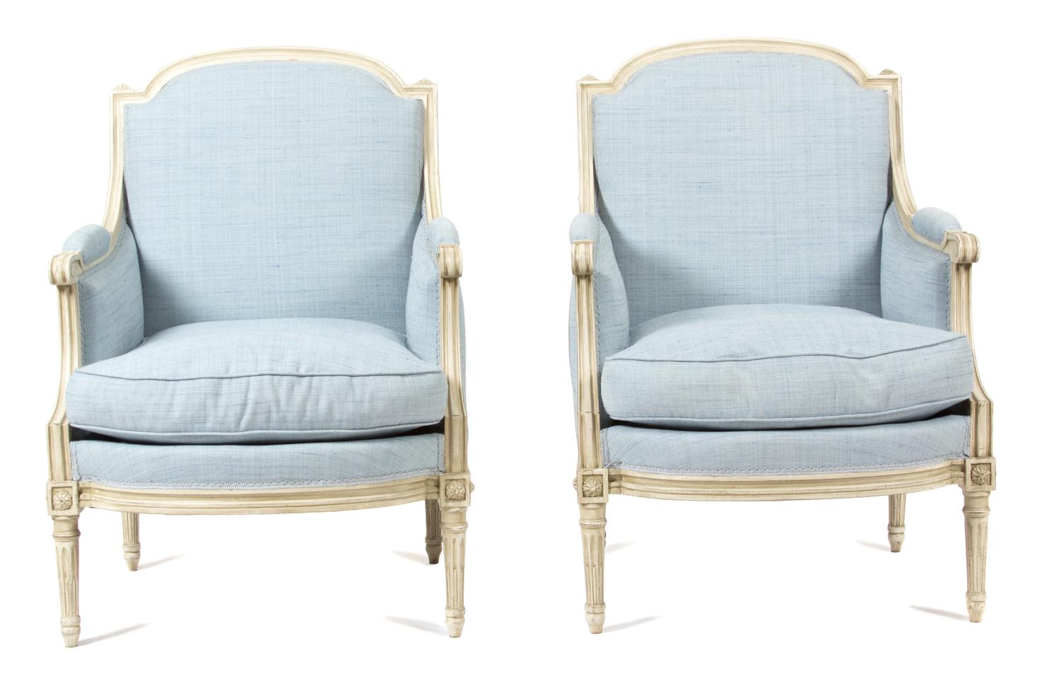 A Pair of Louis XVI Style Carved and Painted Bergeres Height 36 1/2 inches. — LATE 19TH CENTURY