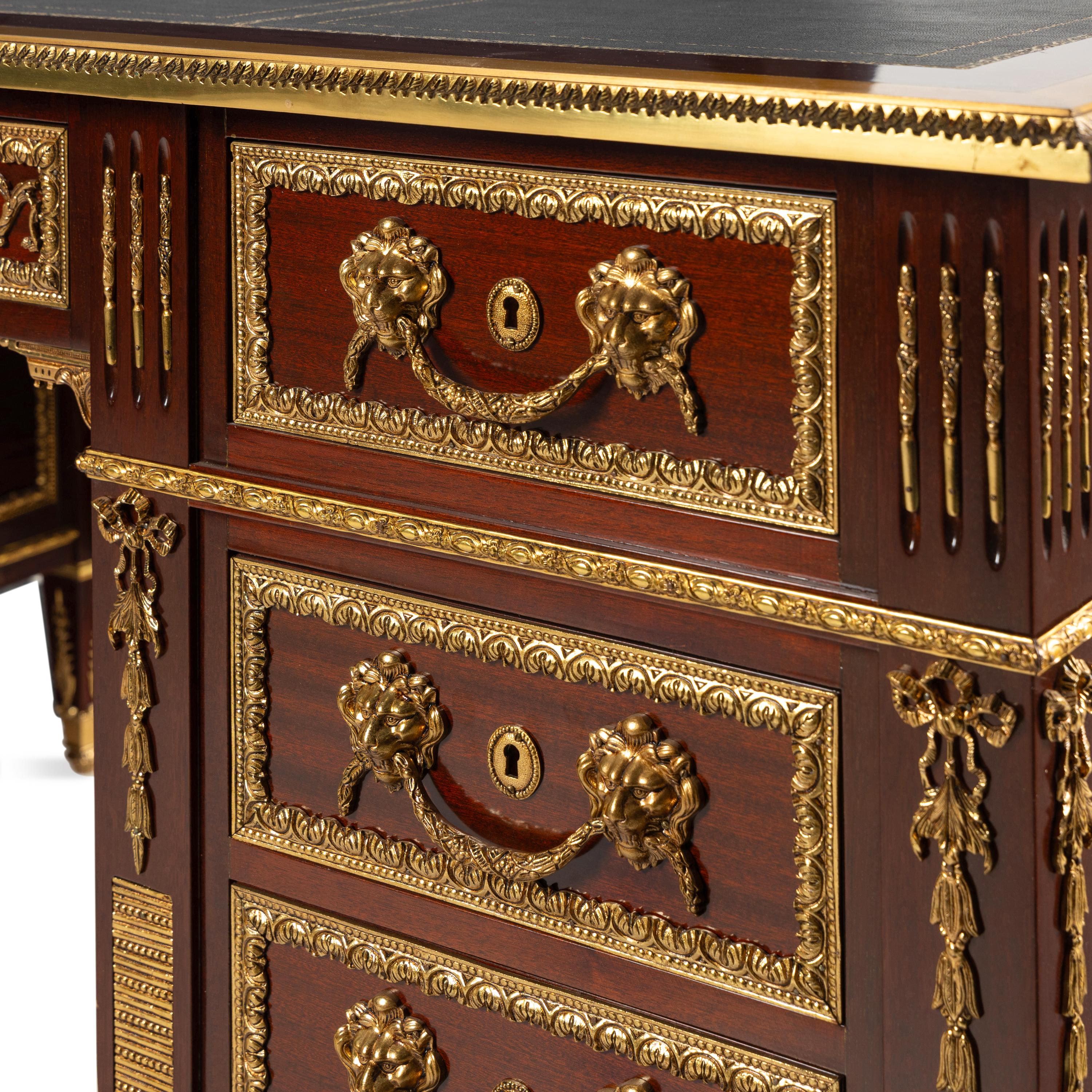 A Louis XVI Style Gilt Bronze Mounted Mahogany Bureau Plat