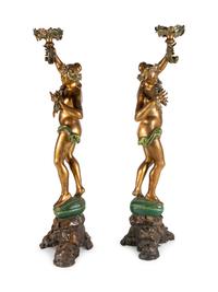A Pair of Continental Gilt and Polychromed Figural Torchères