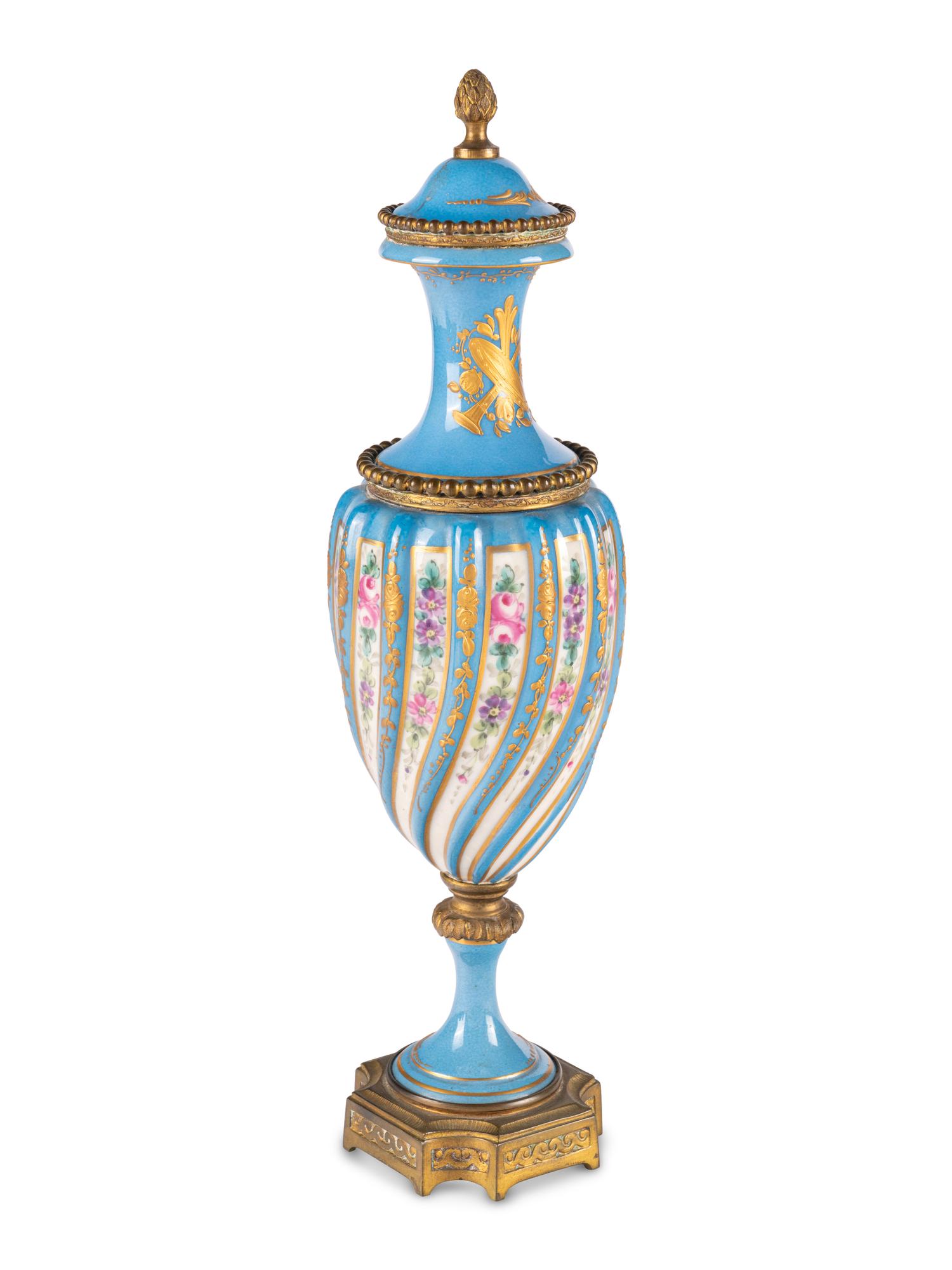 A Sevres Style Gilt Metal Mounted Porcelain Covered Urn