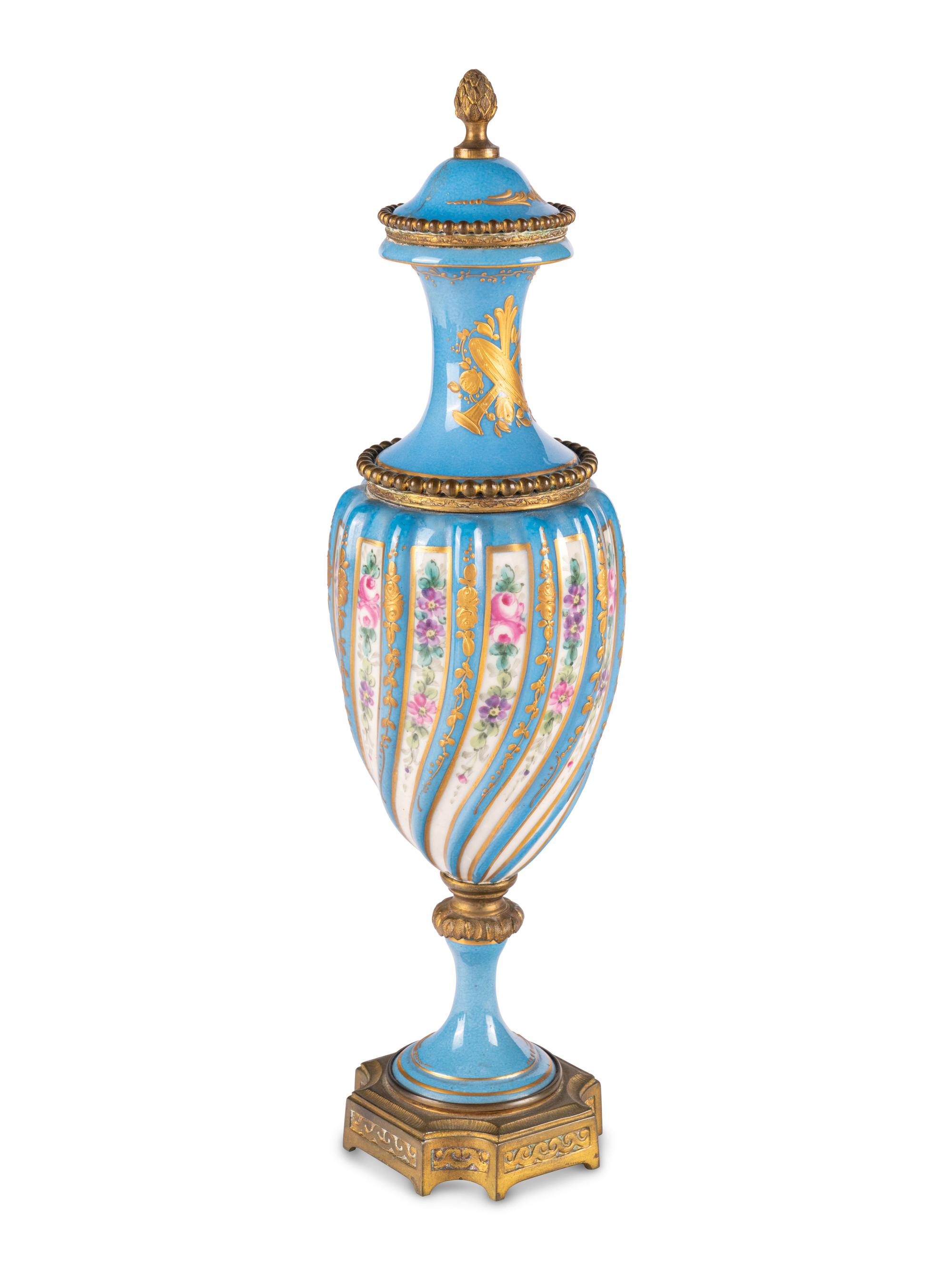 A Sevres Style Gilt Metal Mounted Porcelain Covered Urn
