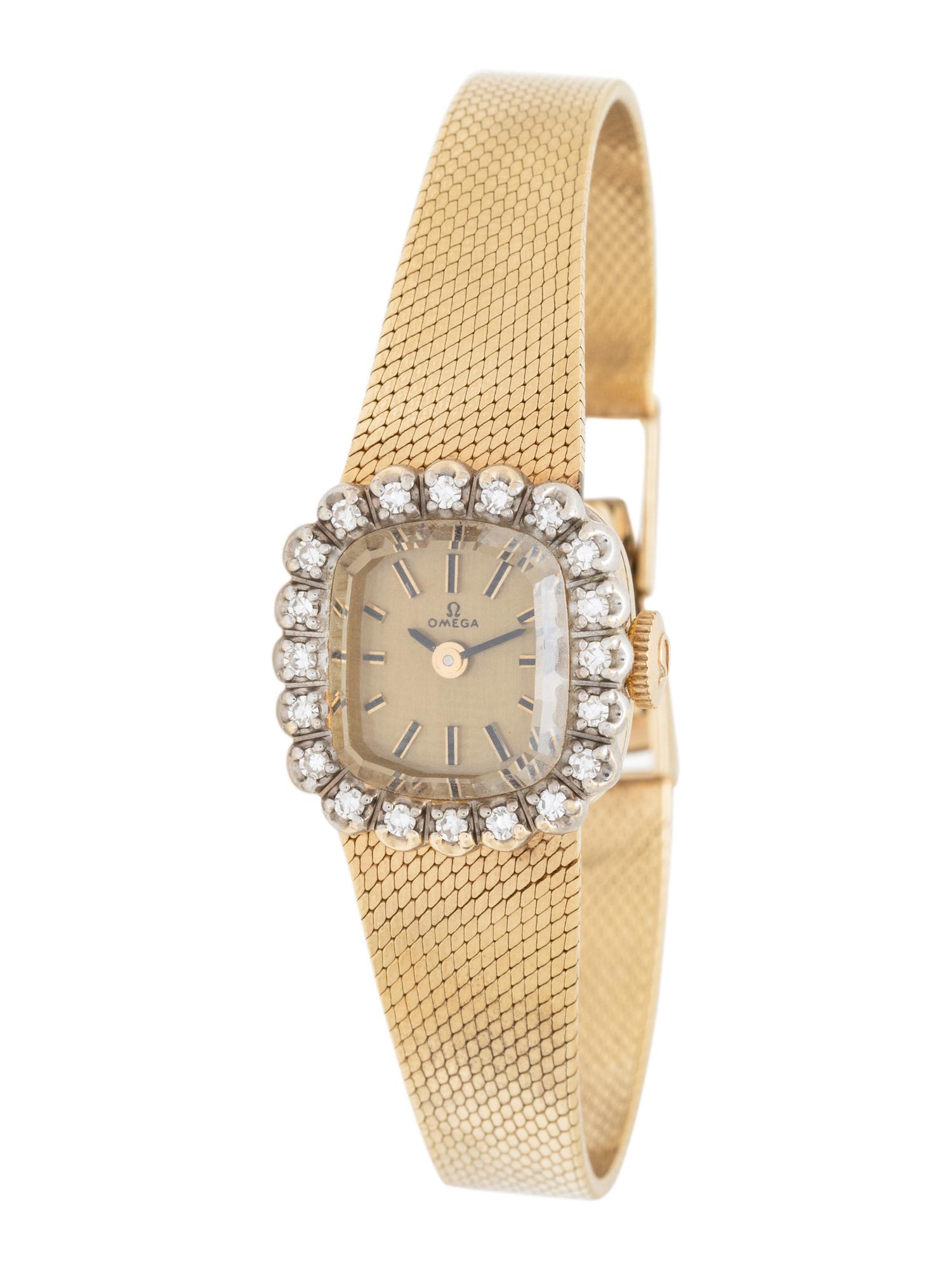 OMEGA, 14 KARAT YELLOW GOLD AND DIAMOND WATCH