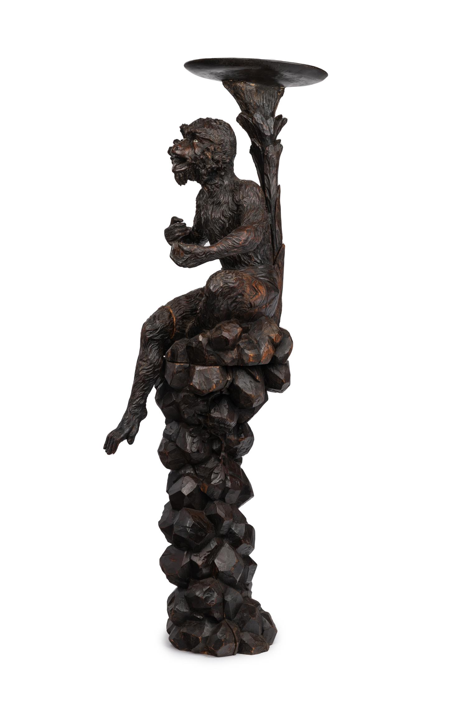 A Venetian Style Carved Walnut Figural Pedestal