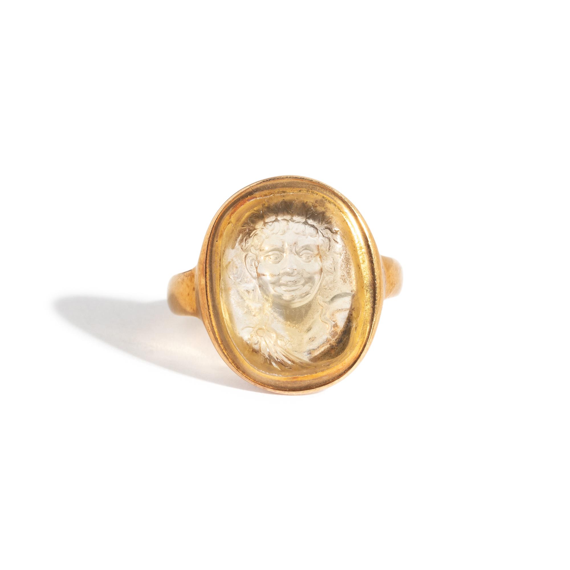 A Roman Citrine Ring Stone with the Bust of a Youthful Satyr — Set in a gold ring