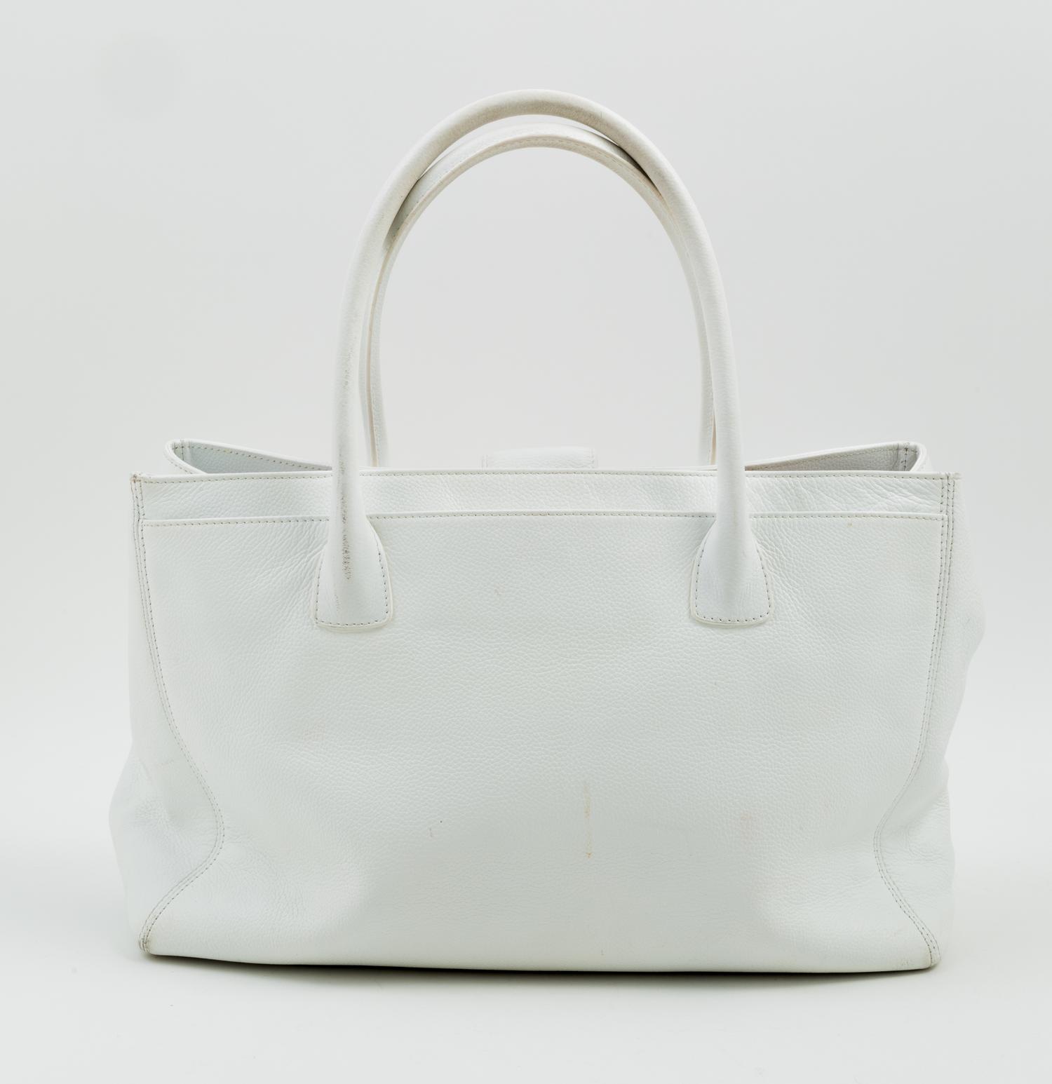 A Chanel White Caviar Tote Bag, 13.3" x 10" x 5.5"; Handle drop: 6.5".