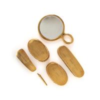 CARTIER, YELLOW GOLD DRESSER SET