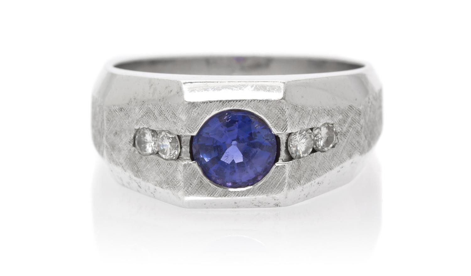 A 14 Karat White Gold, Color Change Sapphire and Diamond Ring, 11.50 dwts.