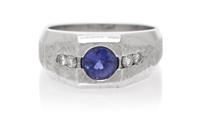 A 14 Karat White Gold, Color Change Sapphire and Diamond Ring, 11.50 dwts.