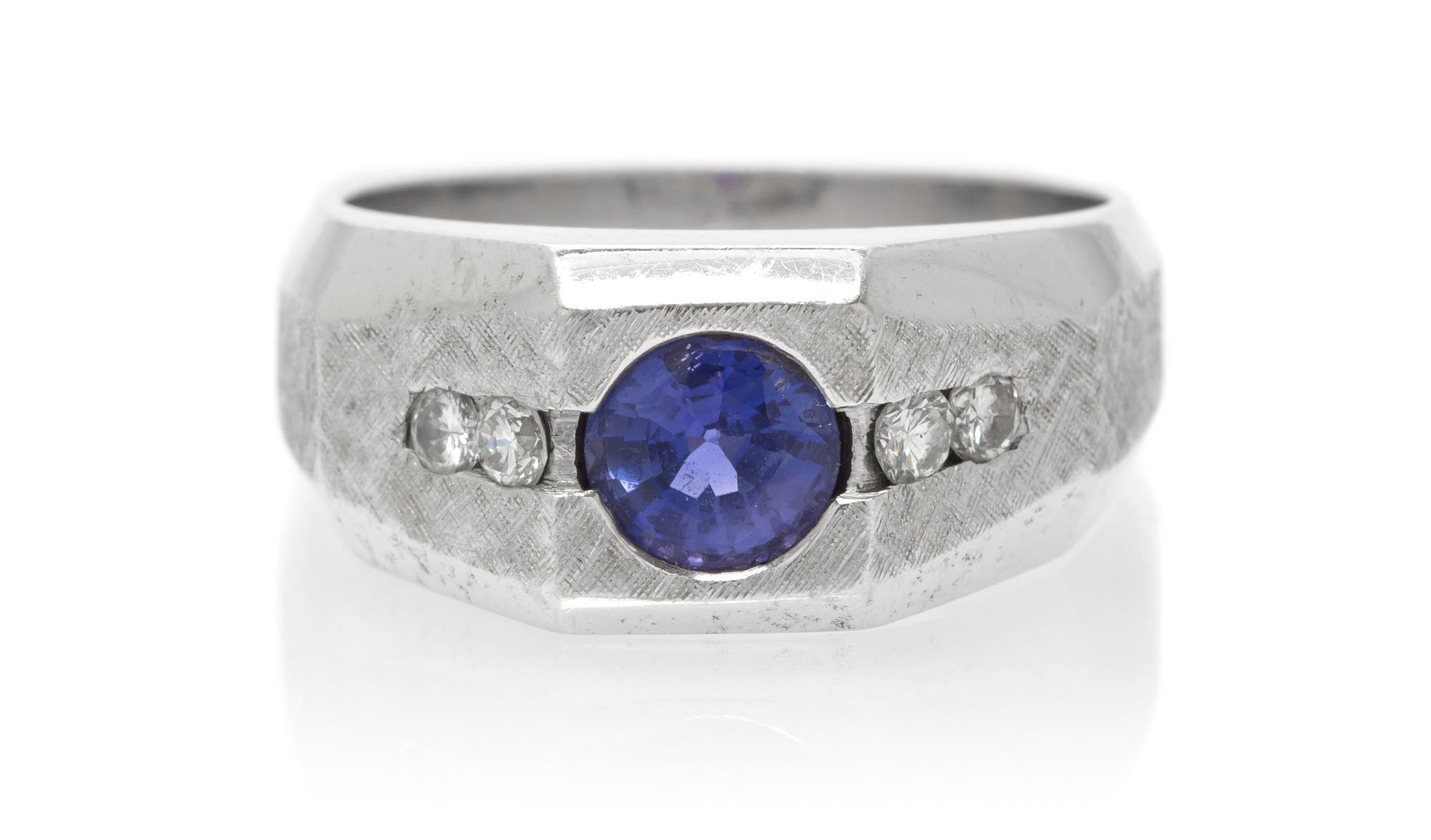 A 14 Karat White Gold, Color Change Sapphire and Diamond Ring, 11.50 dwts.
