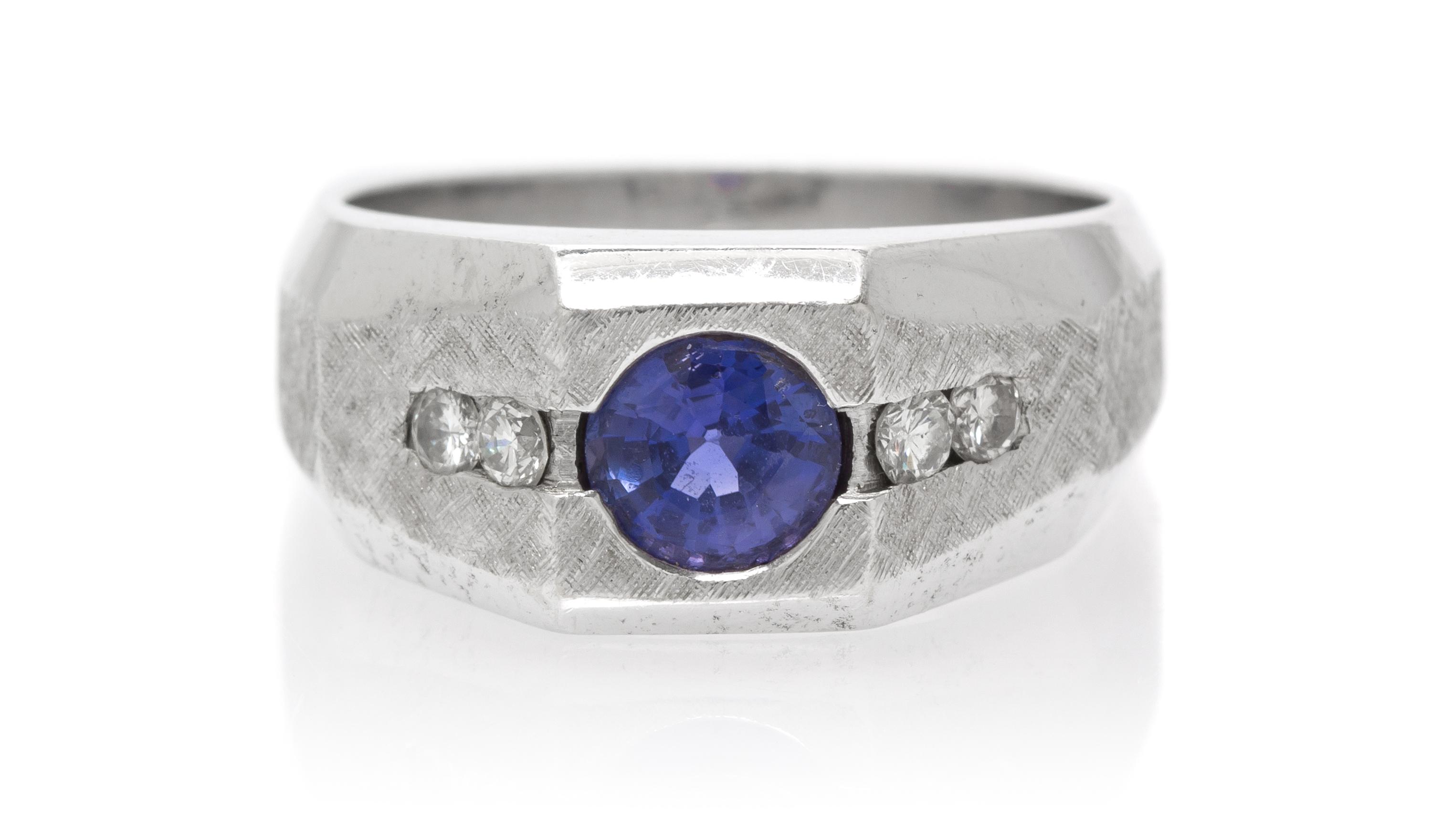 A 14 Karat White Gold, Color Change Sapphire and Diamond Ring, 11.50 dwts.