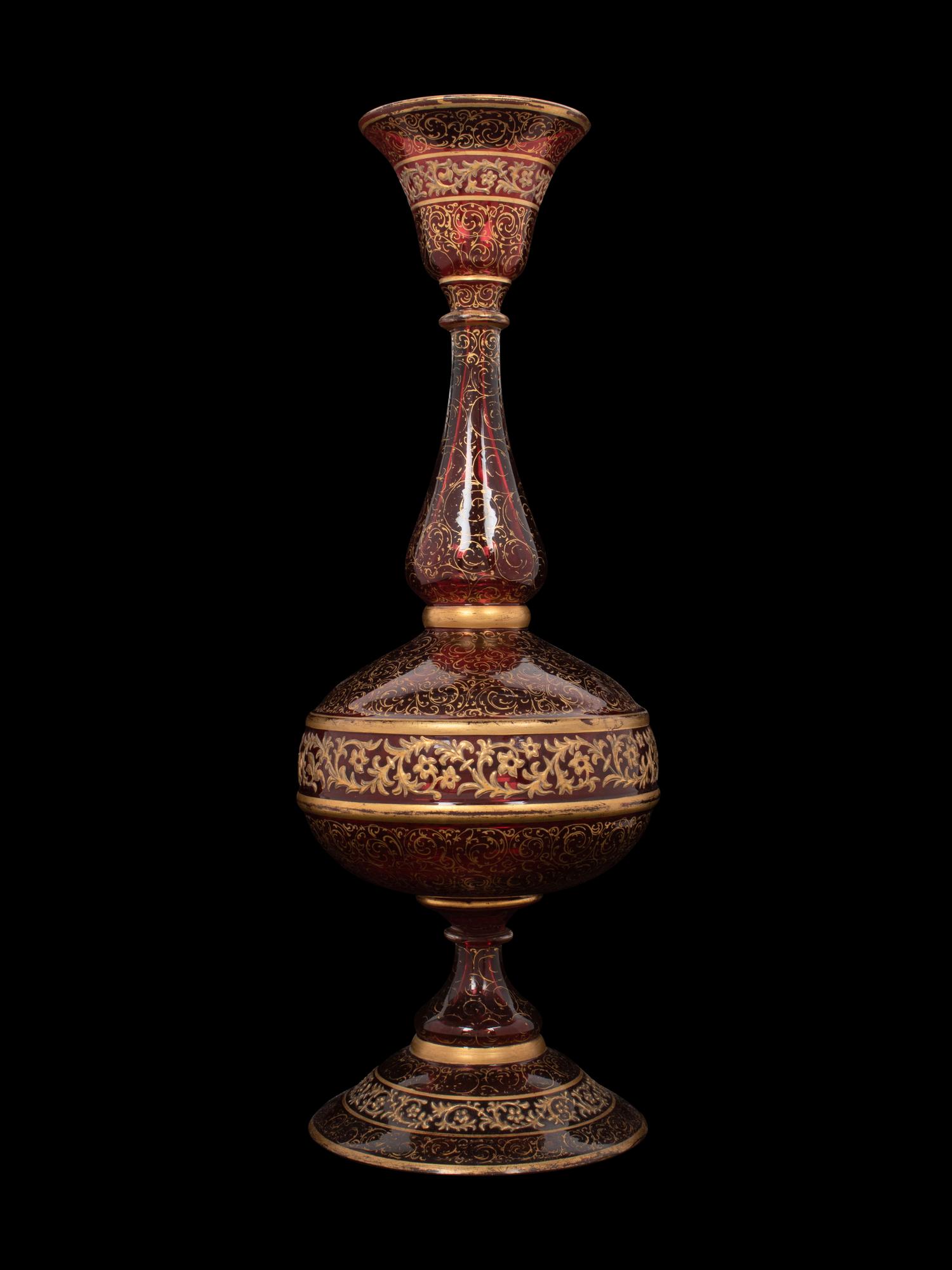 A Persian Market Gilt Decorated Cranberry Glass Vase