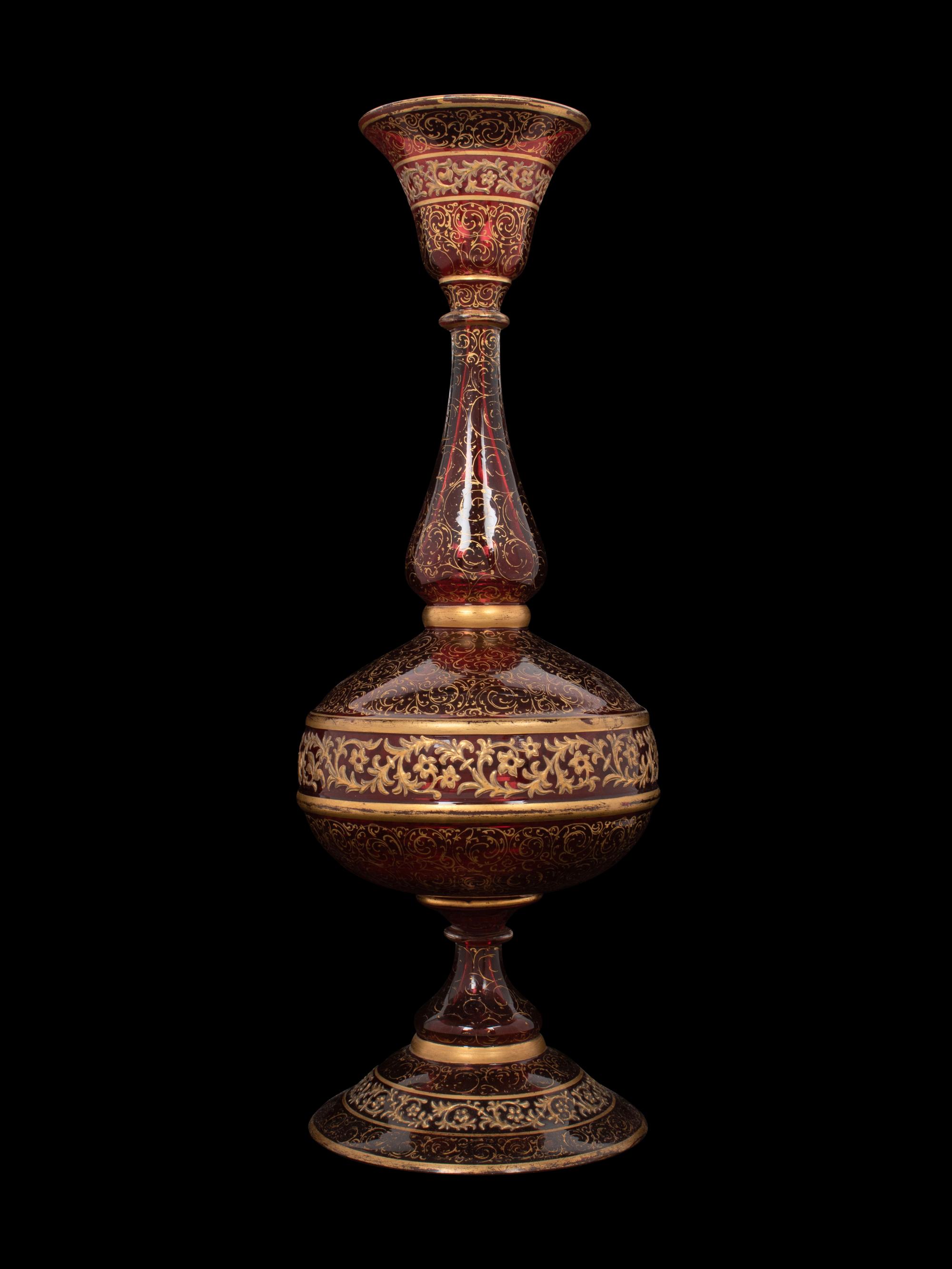 A Persian Market Gilt Decorated Cranberry Glass Vase
