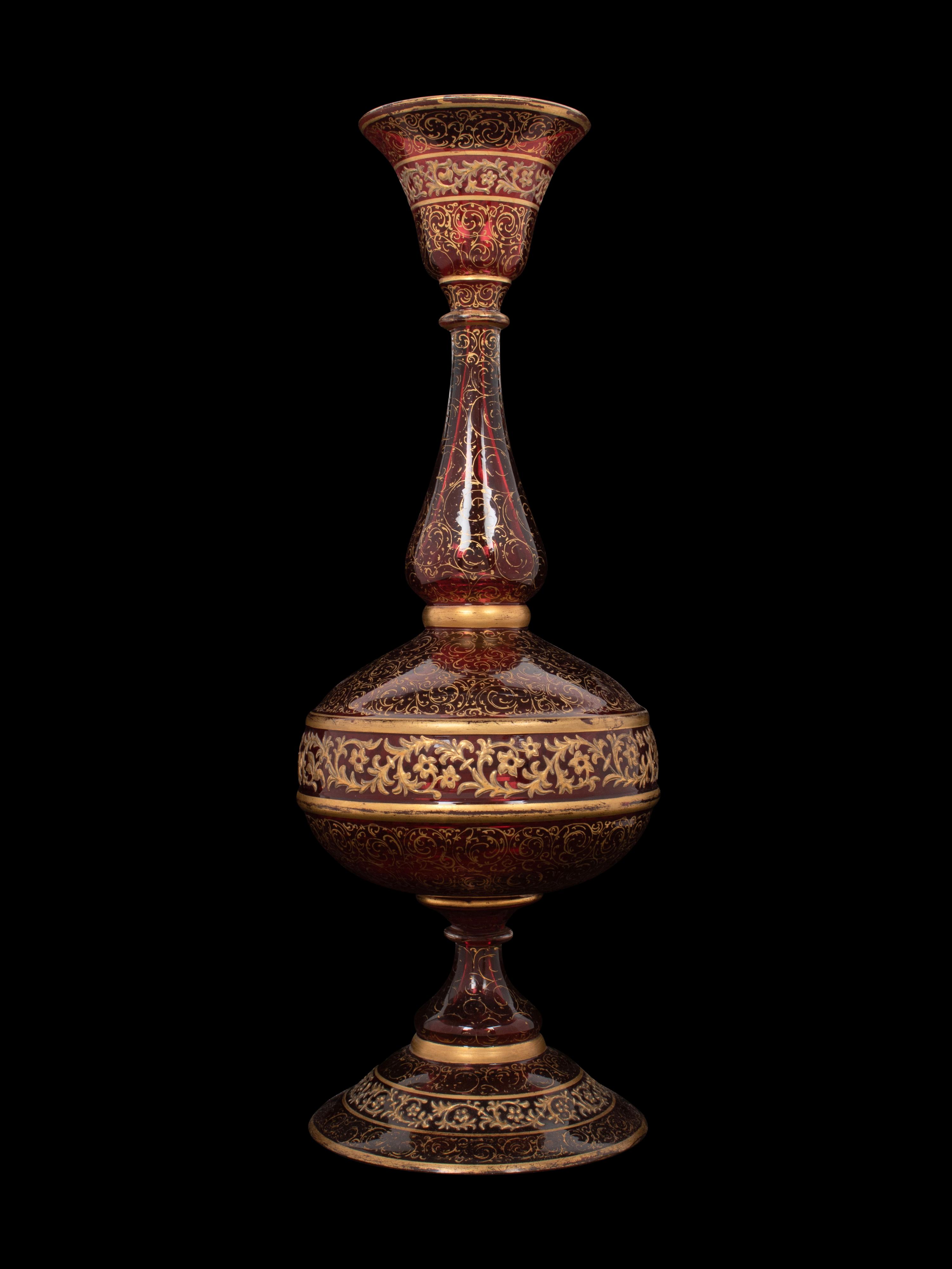 A Persian Market Gilt Decorated Cranberry Glass Vase