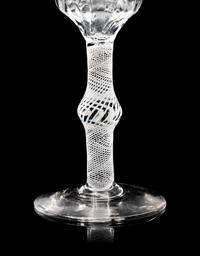 Two Moulded Glass Wine Glasses