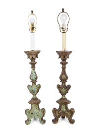 A Pair of Italian Painted and Parcel Gilt Pricket Candlesticks